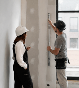 TrueHue decorator preparing a wall for painting